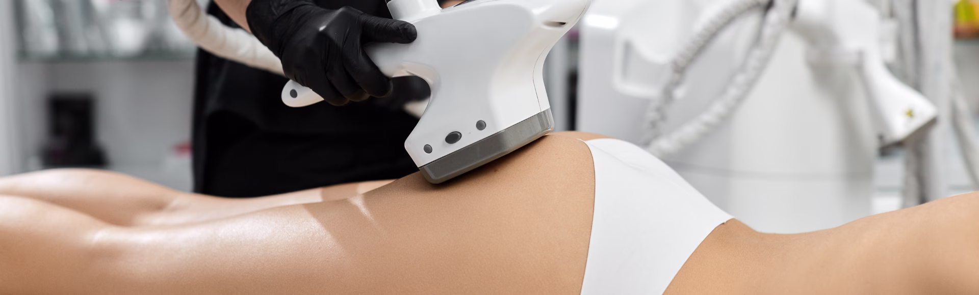 Patient in a non-surgical buttock lift session at Dr. Tatiana Leal's clinic in Bogota.