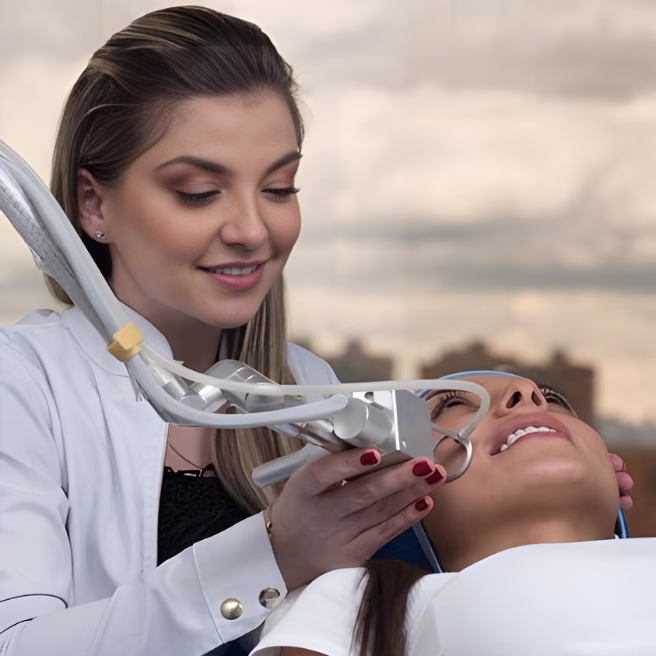 Dr. Tatiana Leal performing laser rejuvenation treatment Advanced laser facial treatment by Dr. Tatiana Leal